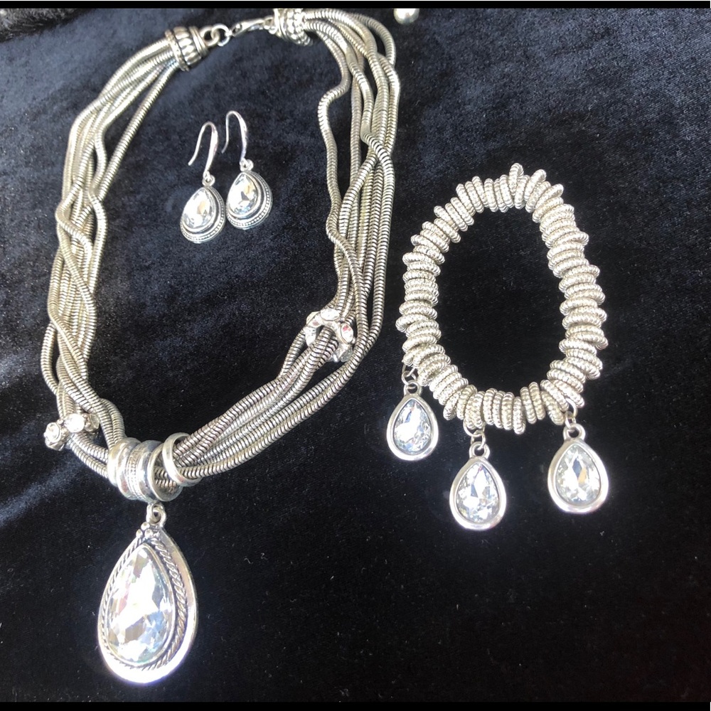 Silver necklace, earring, and bracelet set